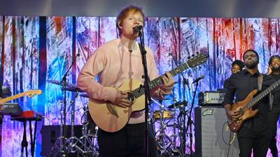 Ed Sheeran surprises college students, performs alongside them