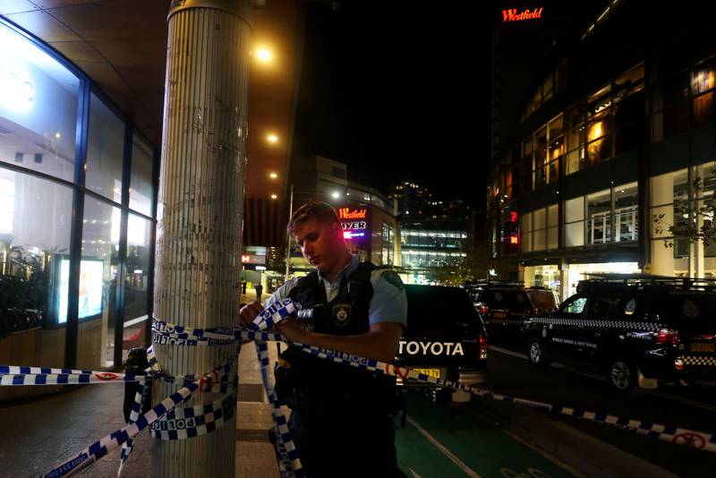BONDI JUNCTION, AUSTRALIA - APRIL 13: NSW police cordon off an area outside Westfield Bondi Junction on April 13, 2024 in Bondi Junction, Australia. Six victims, plus the offender, are confirmed dead following an incident at Westfield Shopping Centre in Bondi Junction, Sydney. (Photo by Lisa Maree Williams/Getty Images)