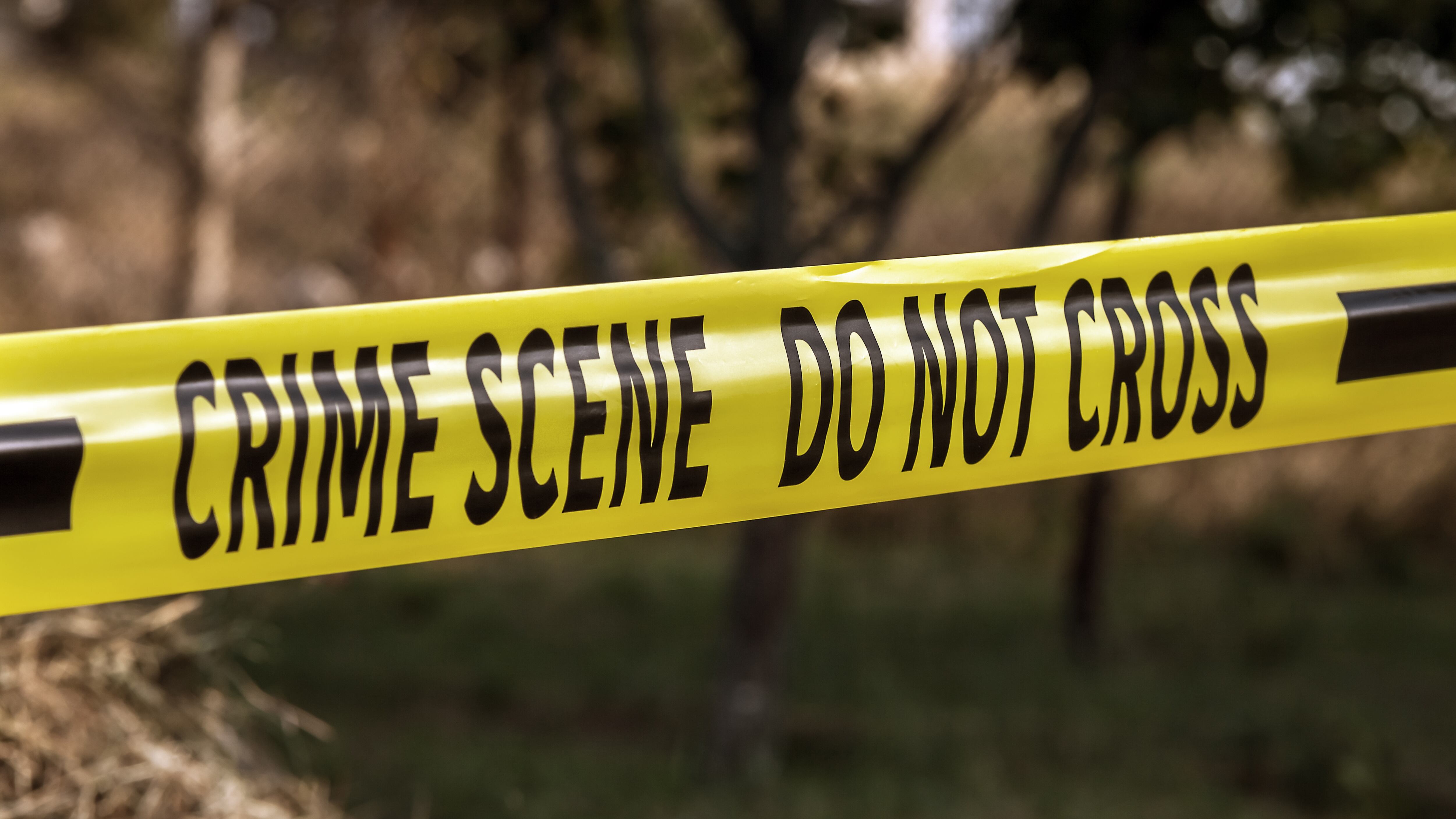 Crime scene tape at a fire scene