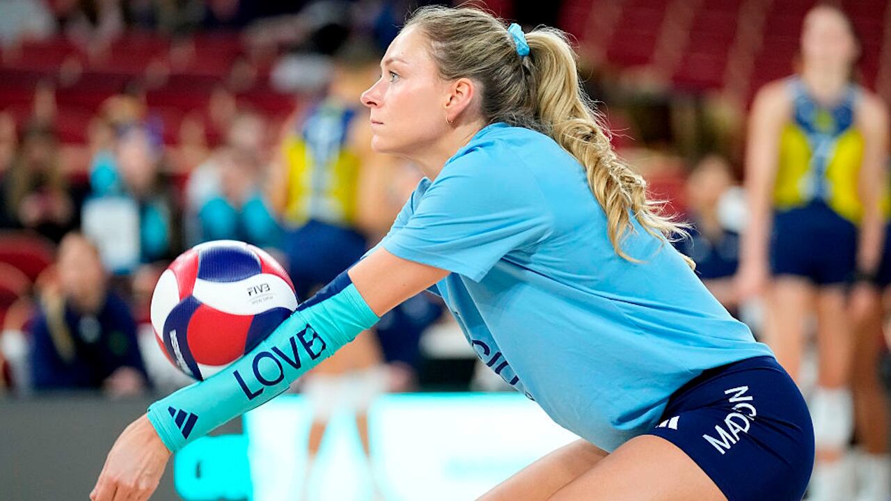 The pro volleyball player from Wisconsin had a surprise when she scanned her wedding invitations.