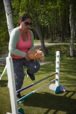 Woman participating in hobby horse competition