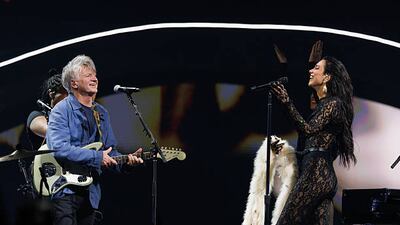 AUCKLAND, NEW ZEALAND - APRIL 04: Neil Finn and Dua Lipa perform during her Radical Optimism Tour at Spark Arena on April 04, 2025 in Auckland, New Zealand. (Photo by Dave Simpson/Getty Images)