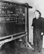 Albert Einstein (1879-1955) lecturing to the American Association for the Advancement of Science at Pittsburgh. Einstein was discussing his latest theory - that it was possible that the universe might be finite after all. (Photo by Daily Herald Archive/National Science & Media Museum/SSPL via Getty Images)